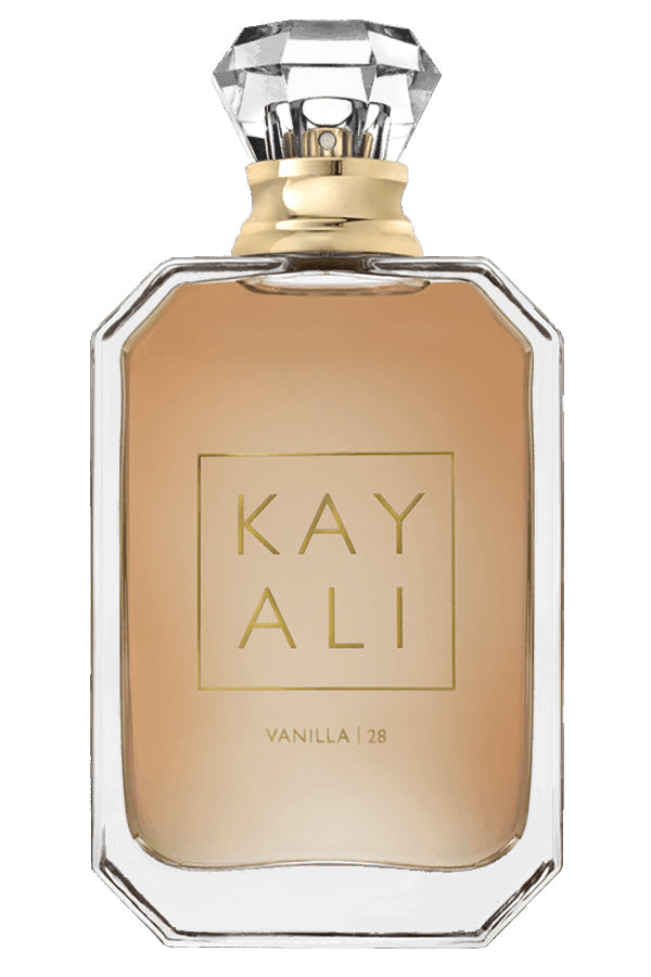 Vanilla 28 Kayali fragrance bottle shown in clear 100ml glass with a minimalist label and black cap, on a neutral background.