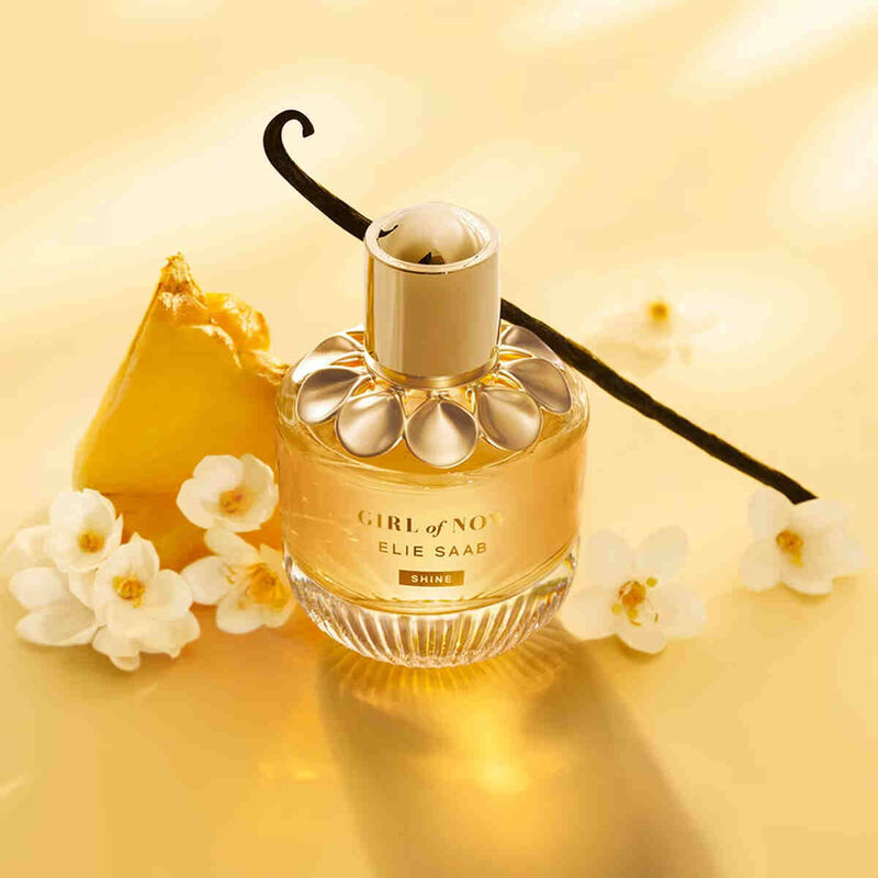 Elie Saab Girl of Now Shine 90ML perfume bottle with a sleek design and floral accents on the packaging.