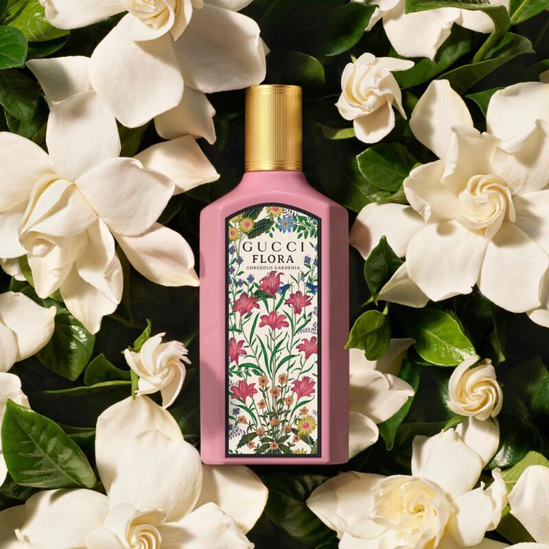 Gucci Flora Gorgeous Gardenia 100ML perfume bottle with floral design, showcasing elegant packaging and branding.