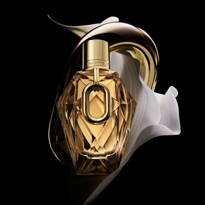 Rabanne Million Gold For Her 90ML perfume bottle with gold accents, elegant design, and luxurious packaging.