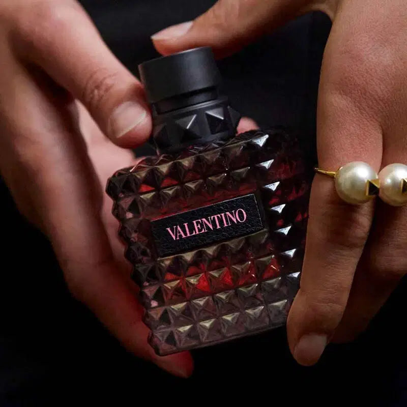 Valentino Born in Roma Donna EDP Intense 100ml perfume bottle with elegant design and floral accents.