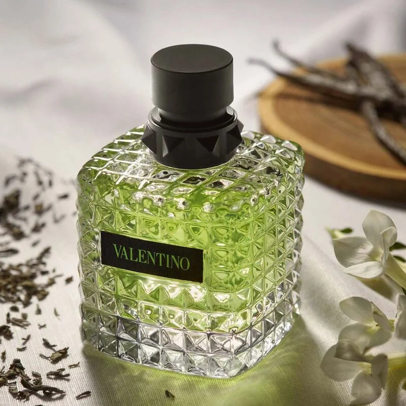 Valentino Donna Born in Roma Green Stravaganza perfume bottle with colorful floral design and elegant shape.