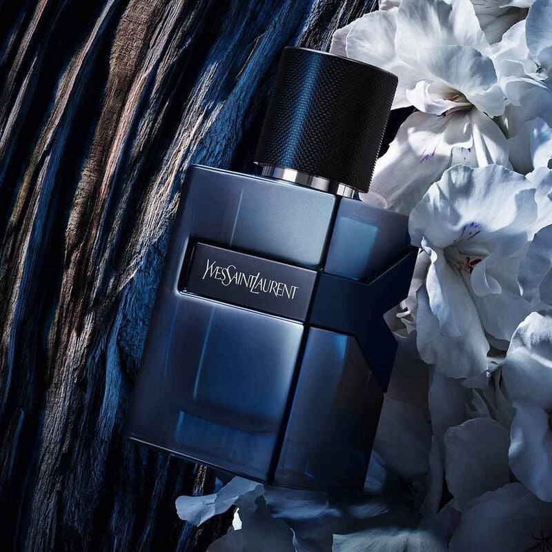 Yves Saint Laurent Y Elixir 100ml perfume bottle with sleek black cap and elegant glass design.