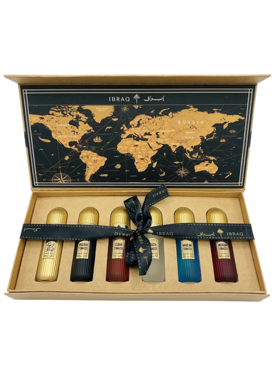 Set of six Tobacco Perfume bottles by Ibrahim Al Qurashi, each 30ml, featuring elegant glass bottles in a luxurious collection.