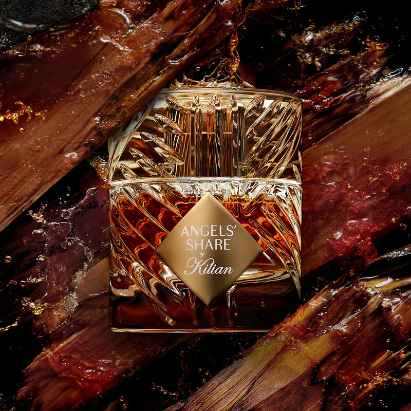 By Kilian Angels' Share 50ML perfume bottle with gold accents and elegant packaging.