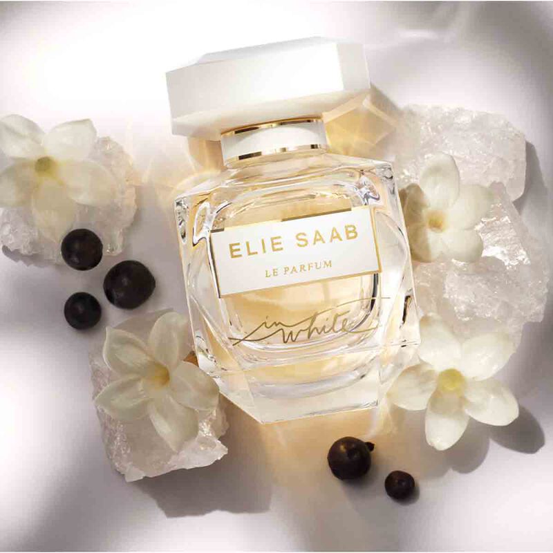 Elie Saab Le Parfum in White 90ml bottle with elegant white packaging and floral design, showcasing luxury perfume branding.