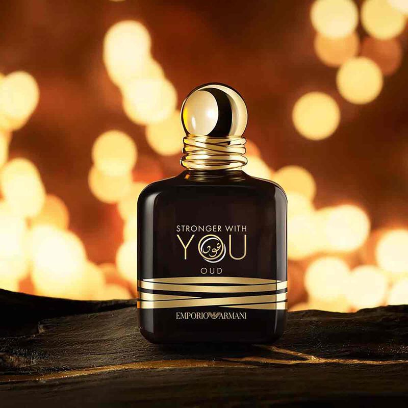 Emporio Armani Stronger With You Oud perfume bottle, 100ml, featuring a sleek glass design with a dark amber liquid fragrance.