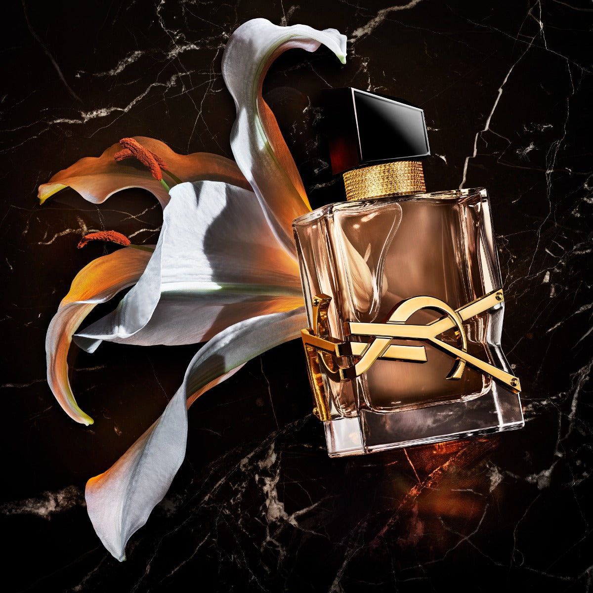 Yves Saint Laurent Libre Flowers and Flames 90ml perfume bottle with floral and fiery design elements.