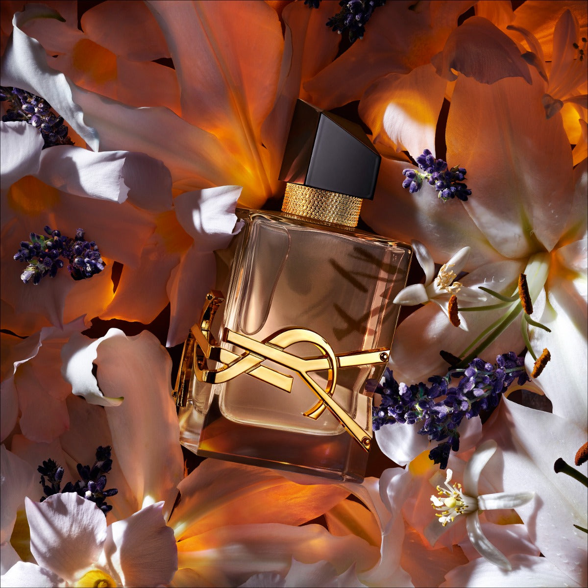 Yves Saint Laurent Libre Flowers and Flames 90ml perfume bottle with floral and fiery design on the packaging