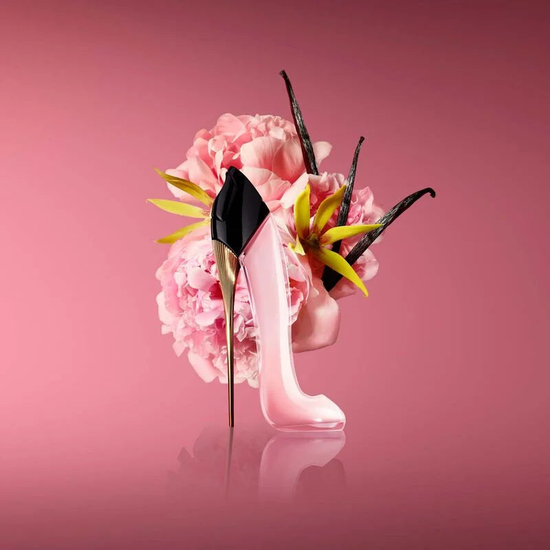 Carolina Herrera Good Girl Blush perfume bottle with pink accents, elegant design, and floral details.