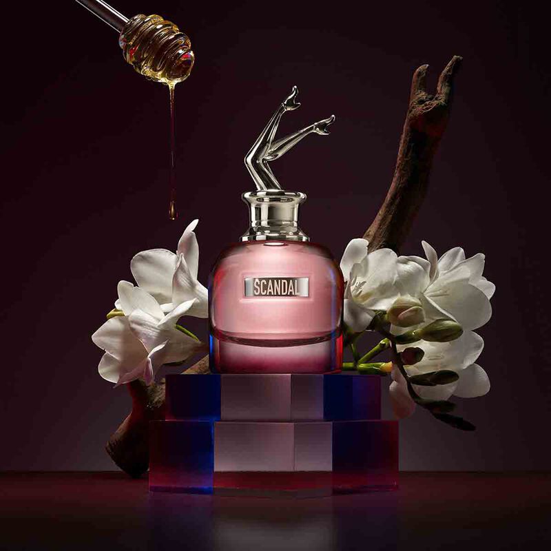 Jean Paul Gaultier Scandal By Night perfume bottle with gold accents and black cap, 80ml size, elegant design.