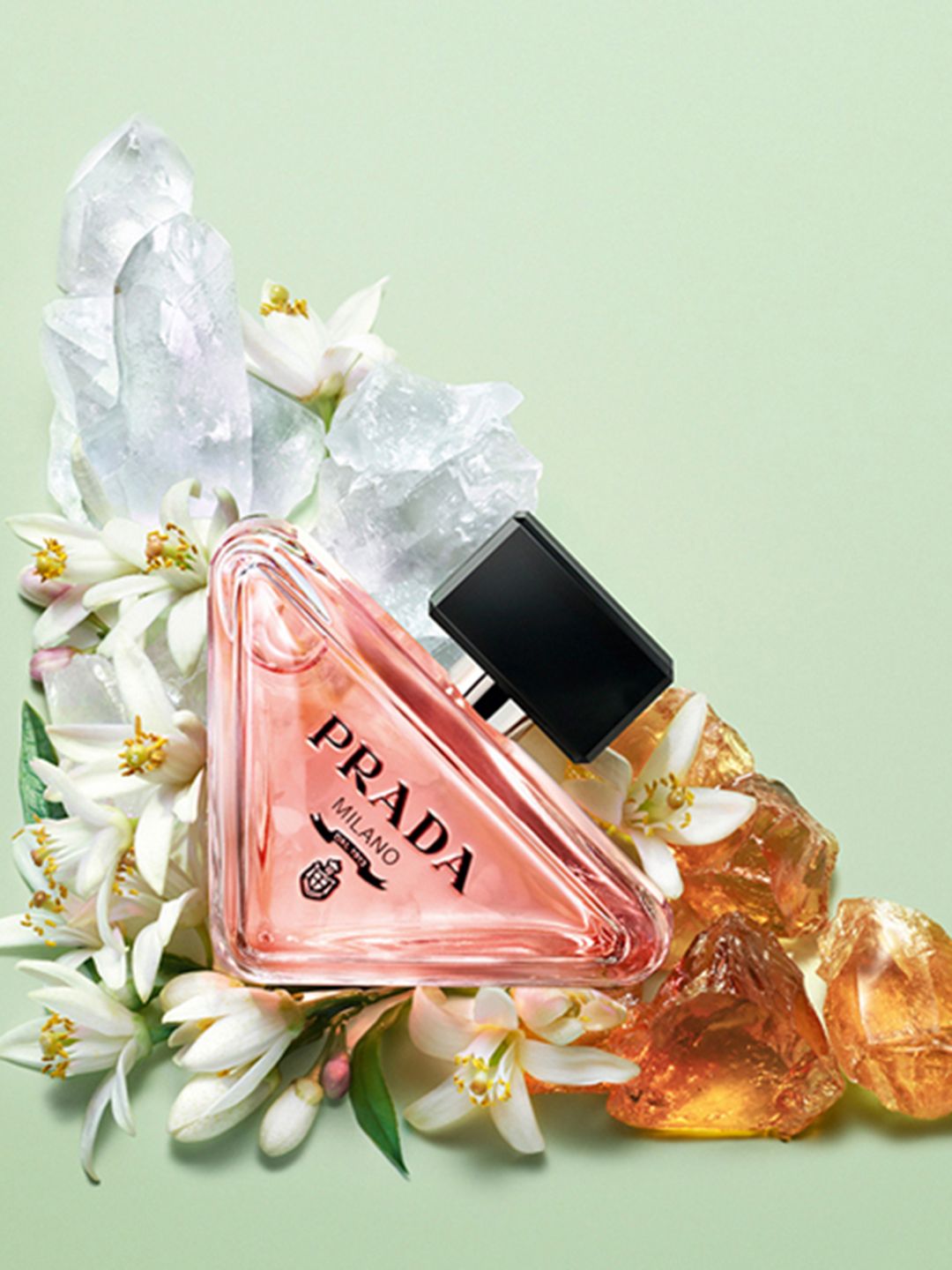 Prada Paradoxe 90ML perfume bottle with sleek design and Prada logo, displayed against a neutral background.