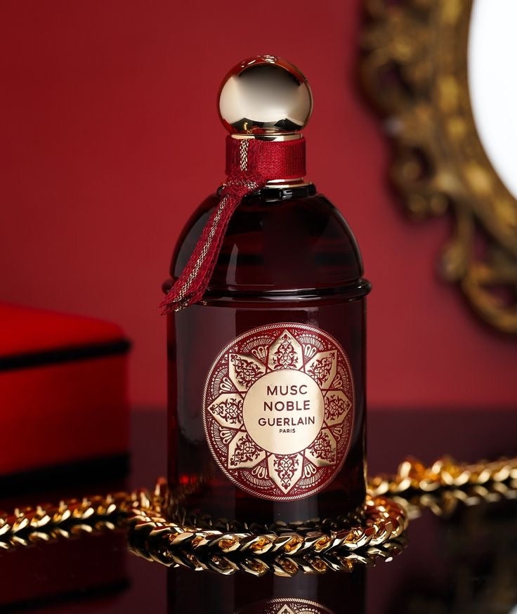 Guerlain Les Absolus d'Orient Musc Noble perfume bottle, 125ML with elegant design and golden accents.