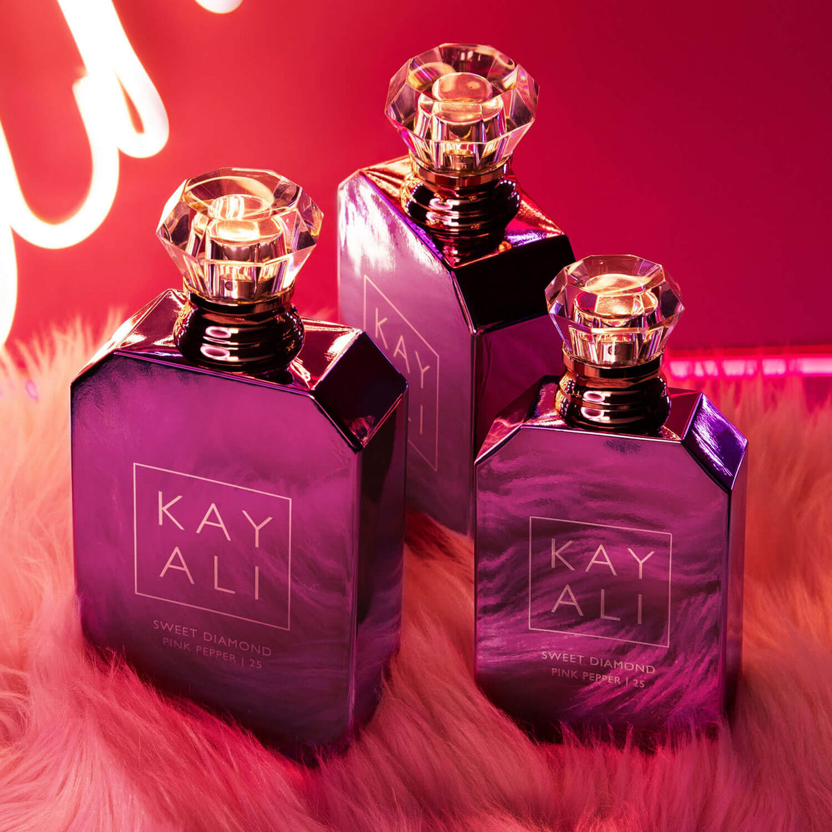 Kayali Sweet Diamond Pink Pepper 25ml perfume bottle with pink accents and elegant packaging.