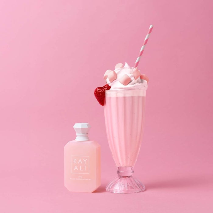 Yum Boujee Marshmallow fragrance by Kayali in a 100ml bottle, with elegant packaging and a clear view of the perfume bottle.