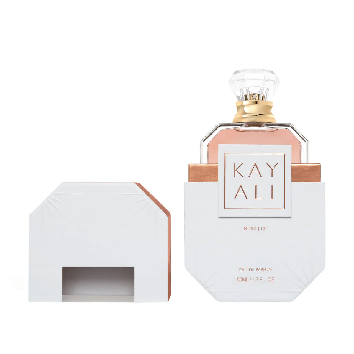 Open box of Kayali Musk 12 fragrance 100ml with sleek packaging, showcasing the luxurious scent and elegant design.