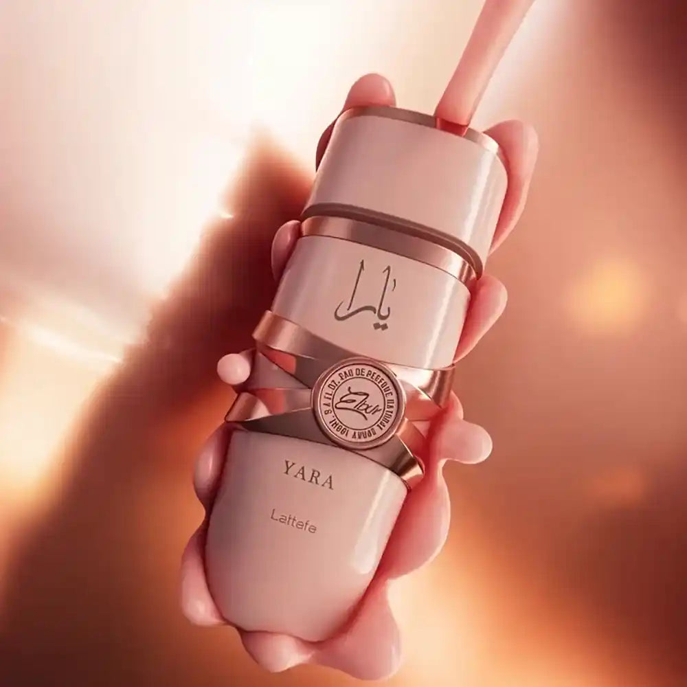 Lattafa Yara Elixir 100ML perfume bottle with elegant design, showcasing luxurious floral and oriental fragrance elements.
