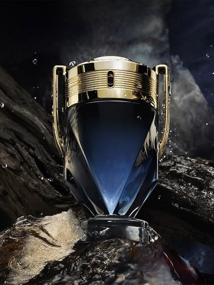 Invictus Parfum by Rabanne for men, 100ml bottle with sleek design and gold accents, showcasing luxury fragrance packaging.