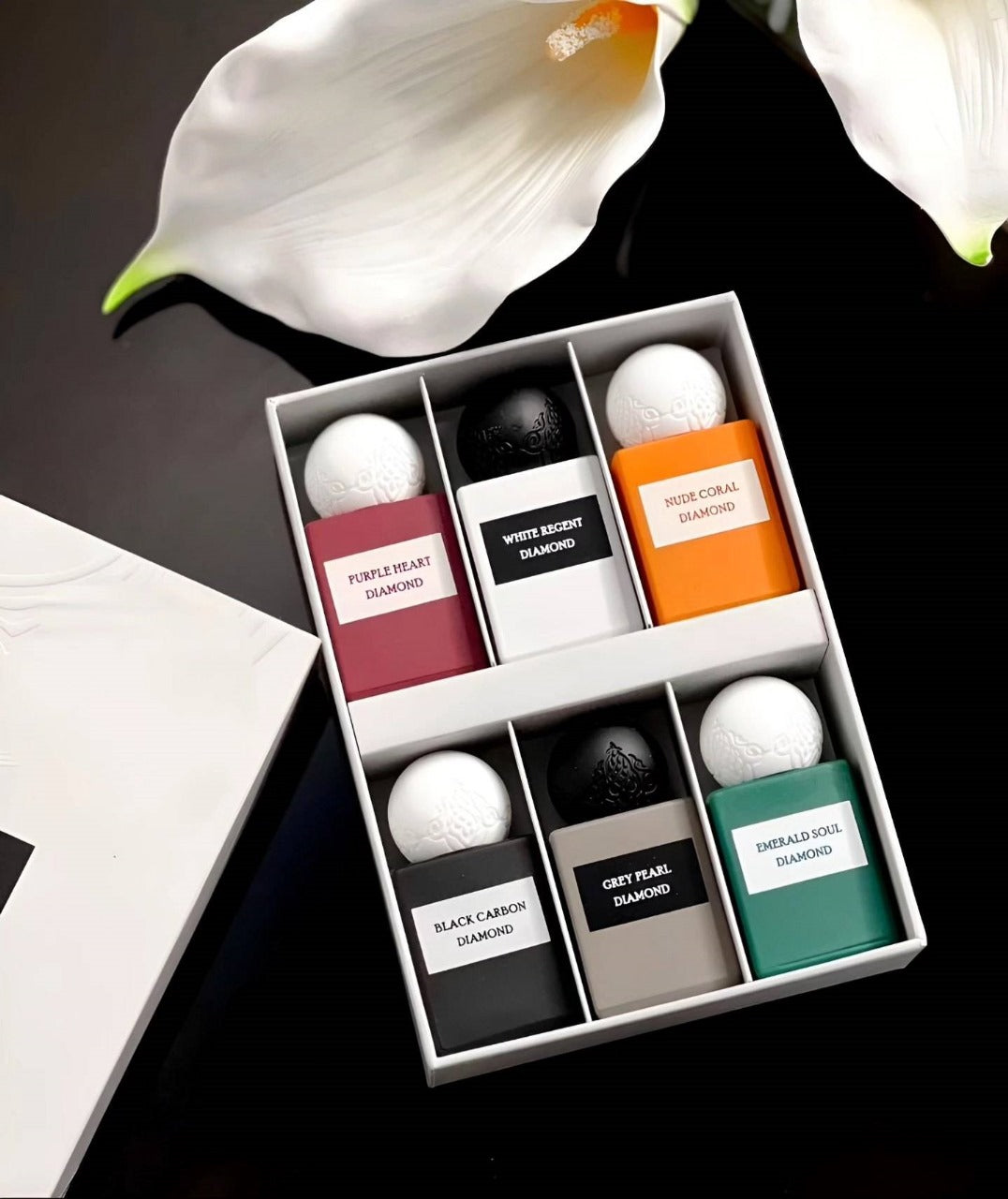 Set of six mini 10ml bottles from Ibrahim Al Qurashi's Diamond Collection, featuring luxurious perfume bottles with elegant designs.