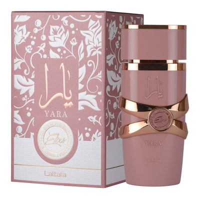 Lattafa Yara Elixir 100ml perfume bottle with elegant design and floral accents on a neutral background.