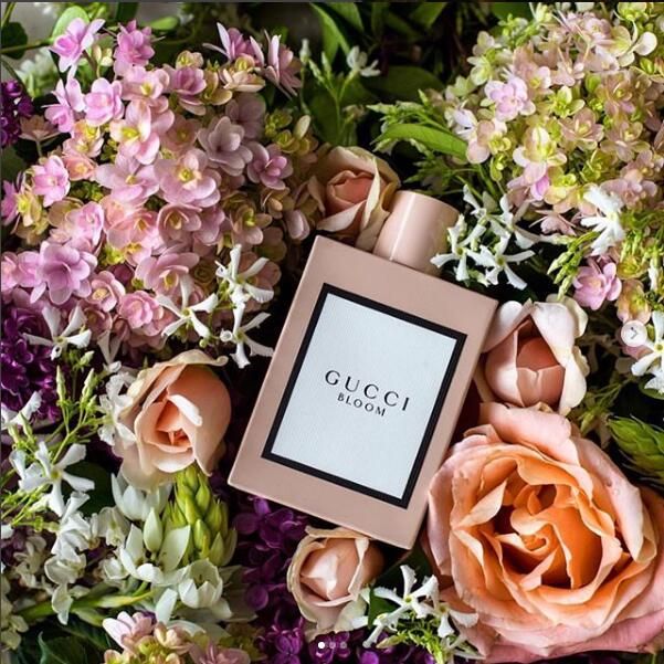 Gucci Bloom Eau de Parfum 100ML bottle with floral design, showcasing the elegant Gucci fragrance packaging and branding.