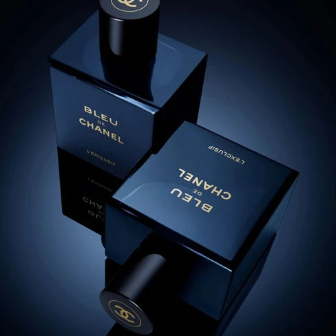 Chanel Bleu de Chanel L'Exclusif 100ML perfume bottle with sleek design and navy blue accents on a white background