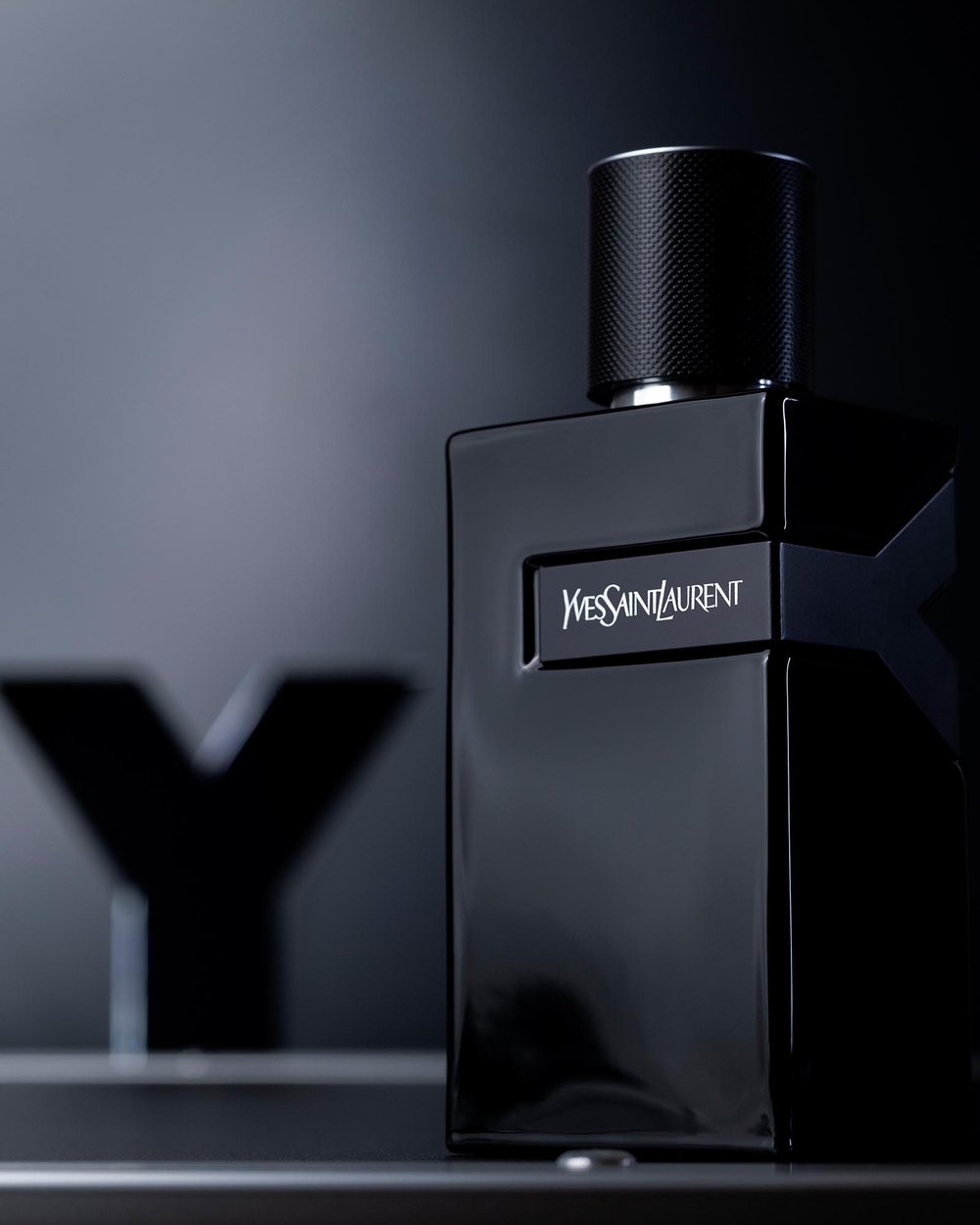 Yves Saint Laurent Y Le Parfum 100ml bottle with sleek black and silver design on a white background