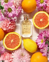 Citrus 08 Kayali fragrance bottle, 100ml, with citrus and floral notes, displayed on a neutral background.