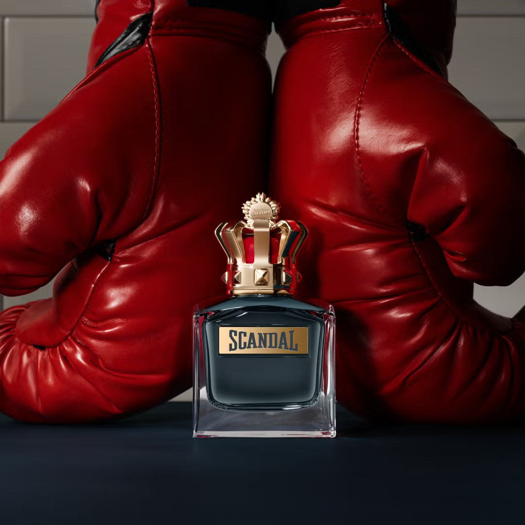 Jean Paul Gaultier Scandal Pour Homme perfume bottle, 100ml, with sleek design and bold branding in a close-up image.