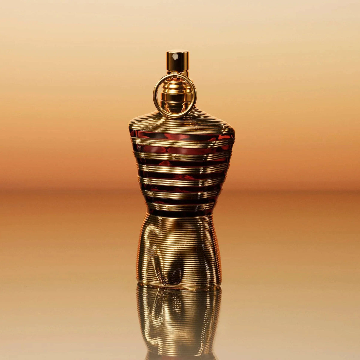 Jean Paul Gaultier Le Male Elixir 125ml fragrance bottle with sleek design and silver accents, displayed on a neutral background.
