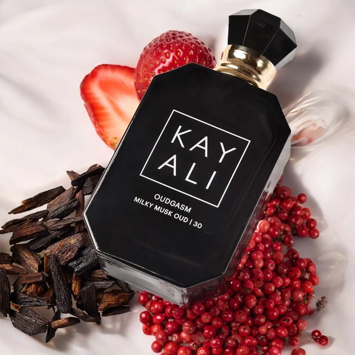 Kayali Oudgasm Milky Musk Oud perfume bottle, 100ml, with elegant packaging and a sleek design for luxurious fragrance.