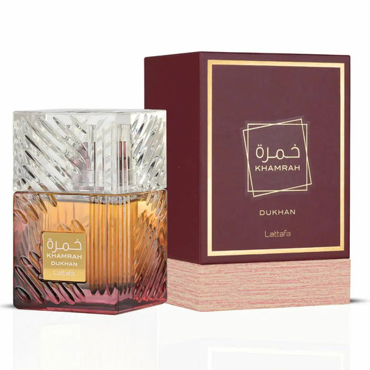 Lattafa Khamrah Dukhan 100ml perfume bottle with elegant black cap and clear glass showing dark fragrance liquid inside.