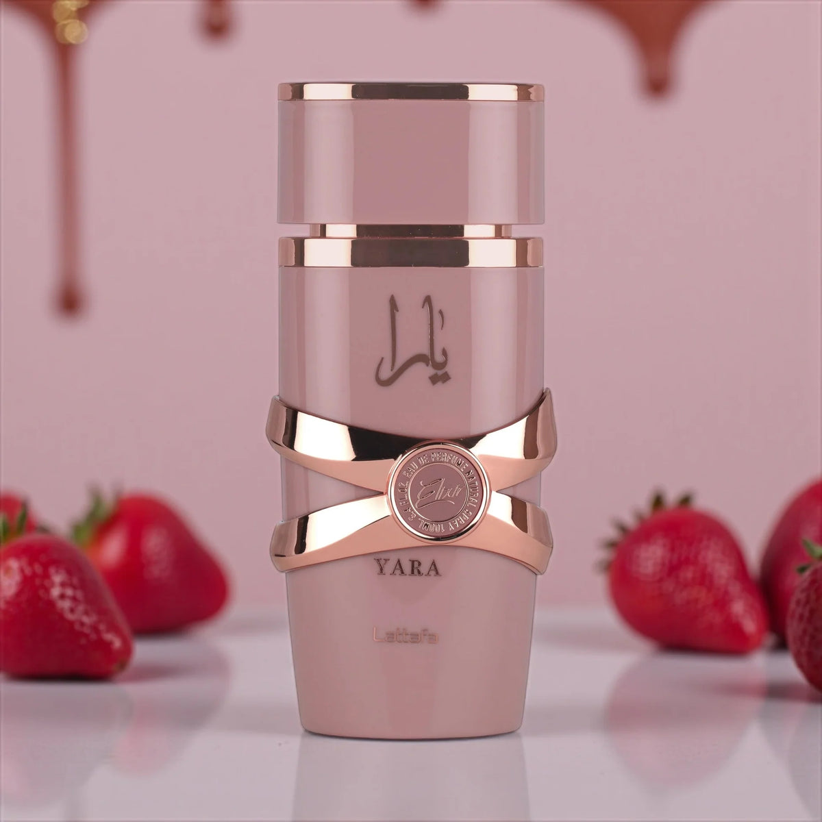 Lattafa Yara Elixir 100ml perfume bottle with elegant design and floral accents, showcasing a luxurious fragrance experience