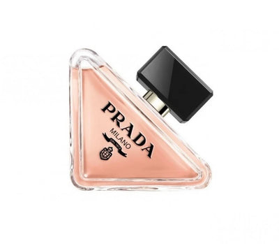 Prada Paradoxe perfume bottle with sleek design, 90ml size, set against a neutral background.
