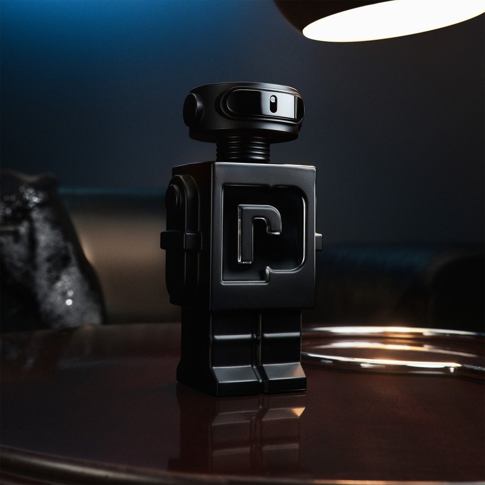 Rabanne Phantom Parfum 100ML bottle with spray nozzle, elegant design and transparent glass showcasing the fragrance inside.