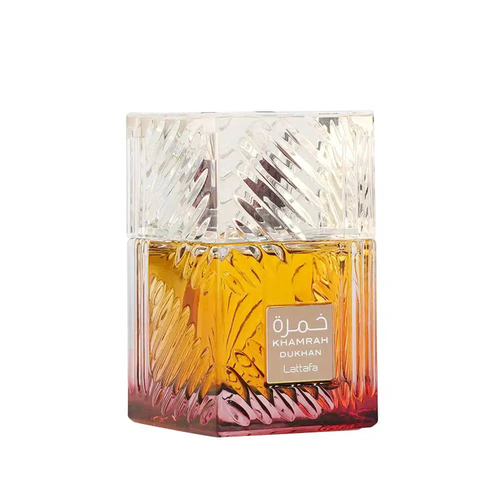 Lattafa Khamrah DUKHAN 100ml bottle with a sleek design and clear label, showcasing the fragrance container.