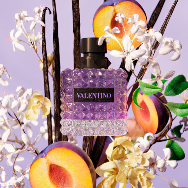 Valentino Donna Born in Roma Purple Melancholia 100ML perfume bottle with purple accents, elegant design and branding visible.