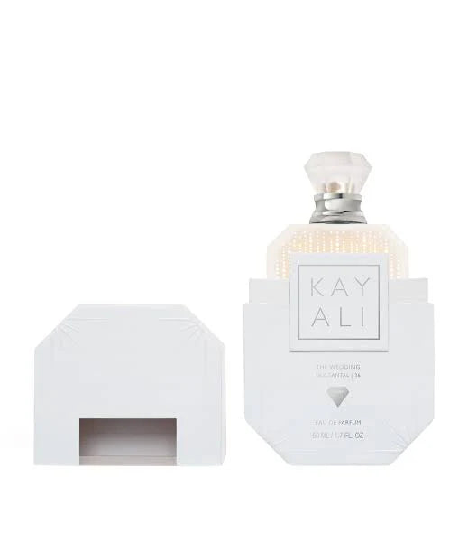 Elegant 100ml bottle of Kayali Wedding Silk Santal 36 fragrance with a sleek design, showcasing the luxurious perfume packaging.