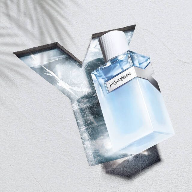 Yves Saint Laurent Y Eau Fraiche 100ml perfume bottle with a sleek design and clear glass showing the fragrance inside.